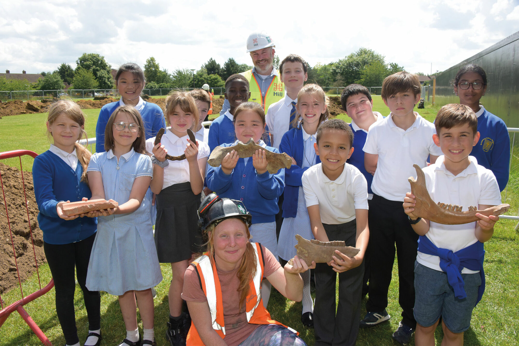 Archaeology visit: Orchard Park Primary and St Laurence Catholic School students came to observe the archaeology being carried out on the football pitch.