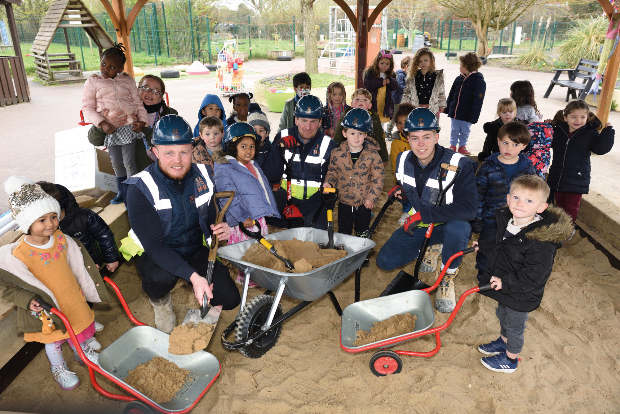 Donation of play sand to the nursery