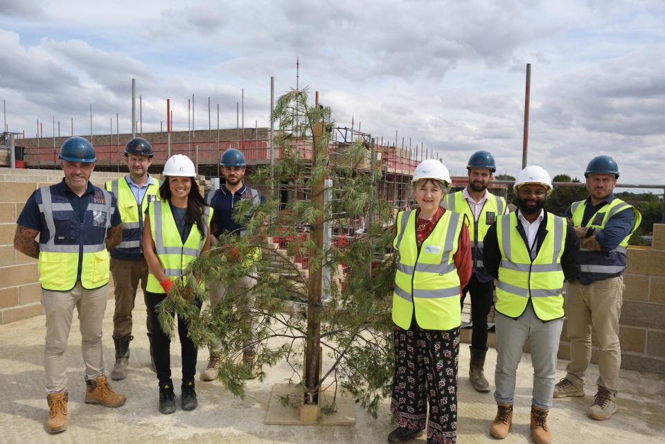 Local councillors and guests were on hand to mark the completion of the highest point of Cambridge Investment Partnership’s Campkin Road